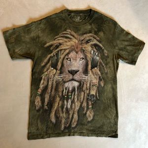 Tie-dye DJ Jahman Lion with dreads and head phones